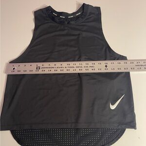 Nike Swim Women’s sleeveless Racerback w crew neck.